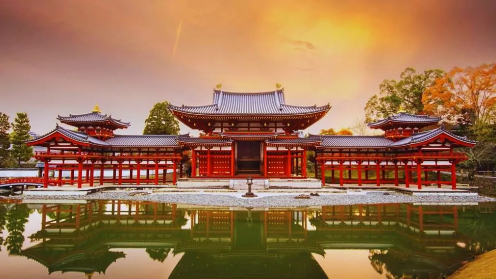 Uji, Kyoto, Japan at Byodo-in Temple's Phoenix hall at dusk.