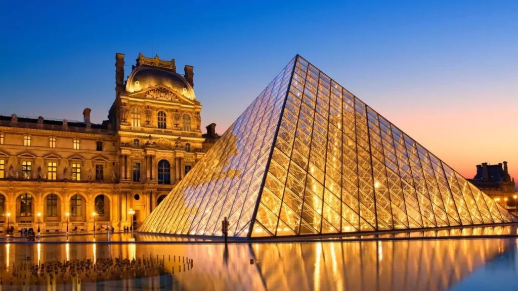 Paris, louvre pyramid at dusk