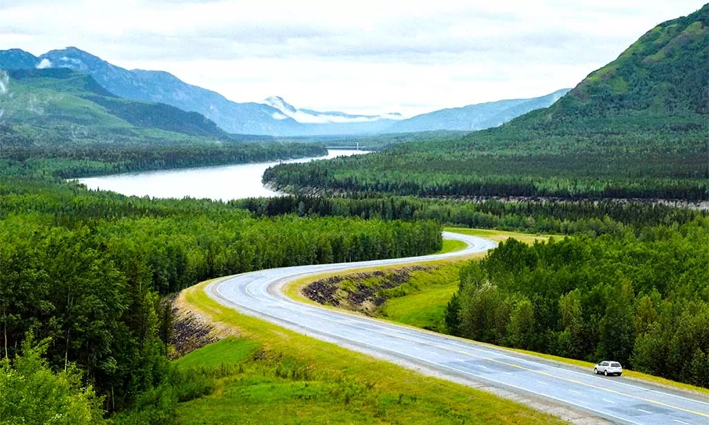 Scenic Mountain Highway with Winding Road and River View