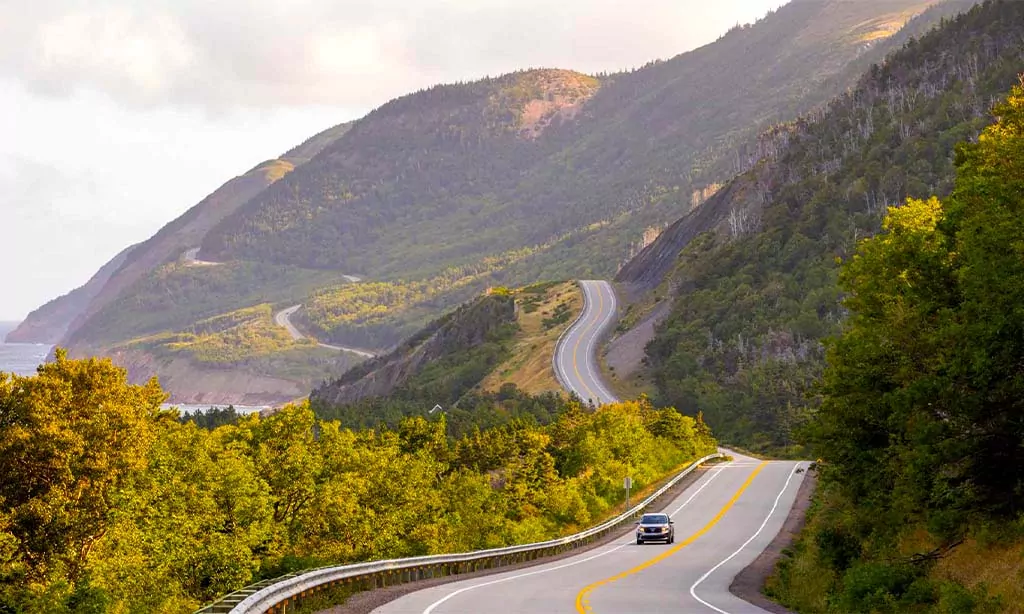 Scenic Coastal Road Trip Through Mountainous Landscape